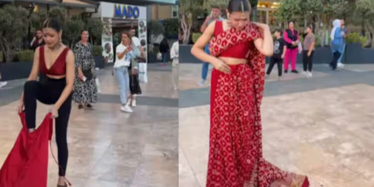 തുര്‍ക്കിയിലെ-തിരക്കേറിയെ-റോഡിൽ-വച്ച്-സാരിയുടുത്ത്-റഷ്യൻ-യുവതി;-പിന്നാലെ-എത്തി-സുരക്ഷാ-ജീവനക്കാരൻ,-വിവാദം